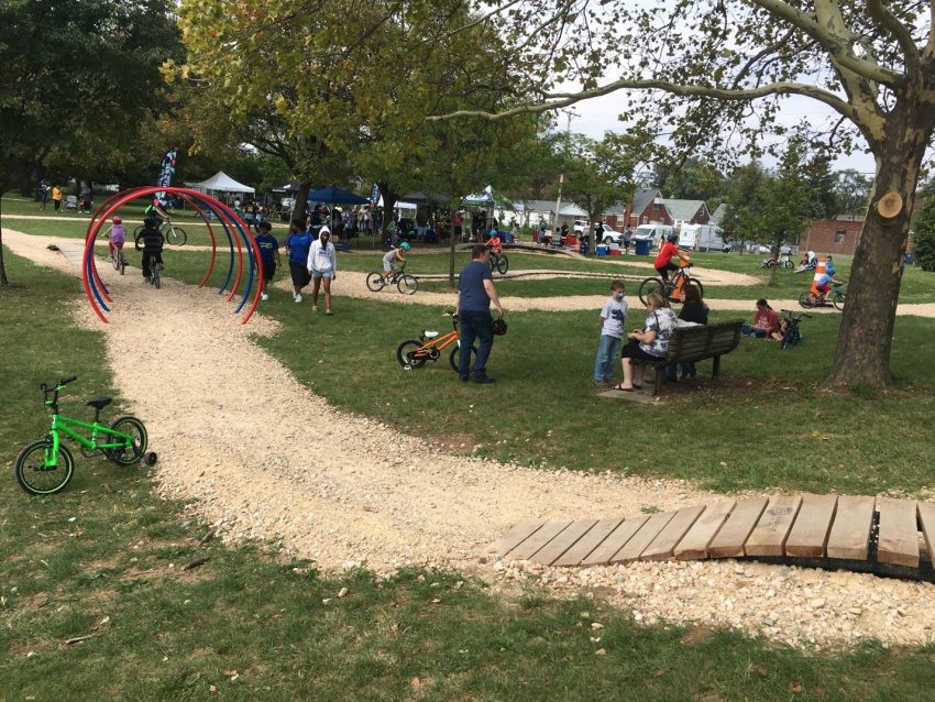 Families using bicycle playground at Dayton Bike Yard